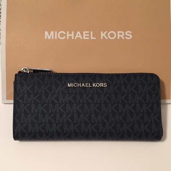 Michael Kors Handbags - NEW Michael Kors Monogram Blue Wallet